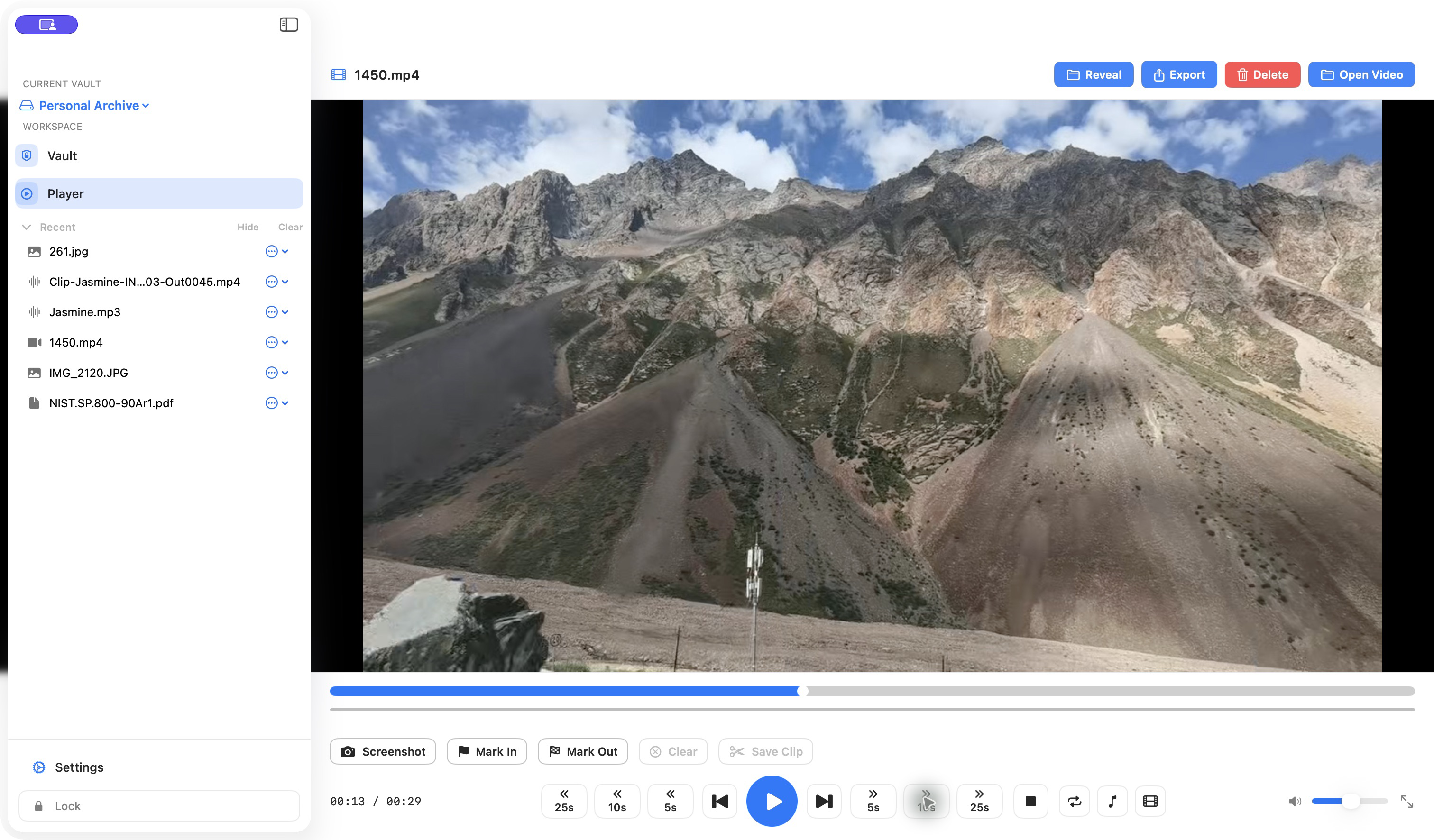 DeskVault playing a real mountain video with timeline, screenshot, mark-in, mark-out, and clip controls
